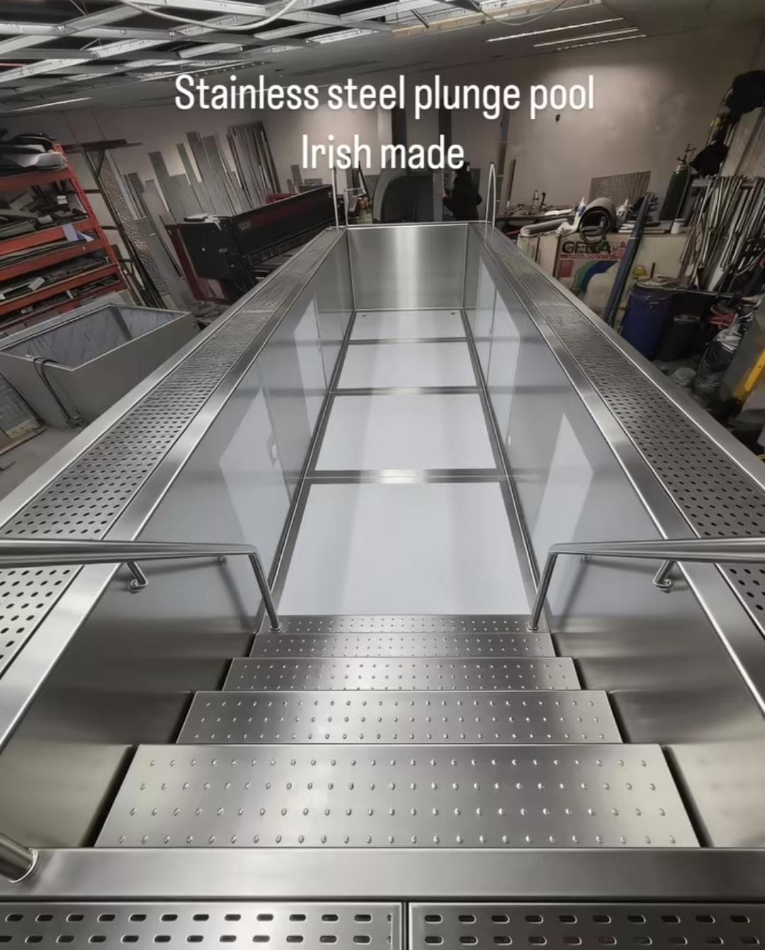 Stainless steel pool ladder with anti-slip steps on SS plunge pool
